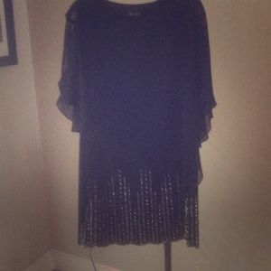 Sleek black dress slenderizing